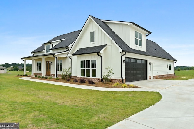 284 Community House Rd, Barnesville, GA 30204 - modern inspired farmhouse with driveway, board and batten siding, a front lawn, roof with shingles, and a garage