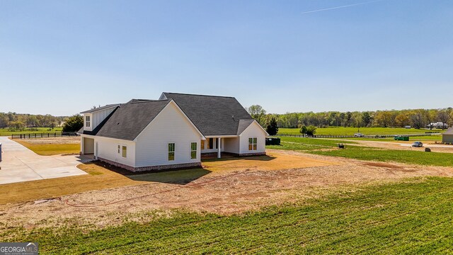 284 Community House Rd, Barnesville, GA 30204 - view of property exterior with driveway and a yard