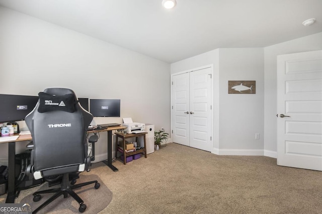 home office featuring carpet and baseboards