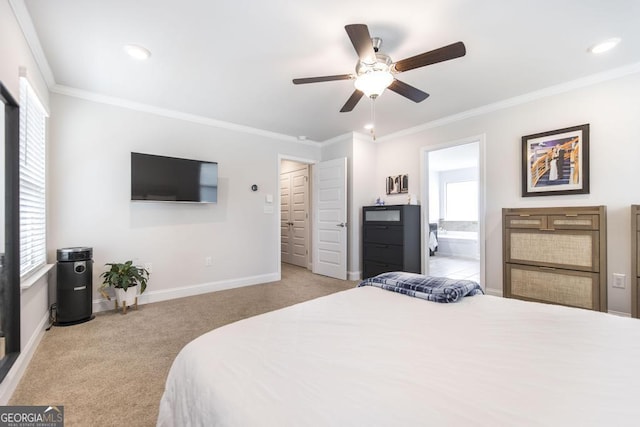 bedroom featuring baseboards, ornamental molding, recessed lighting, ensuite bathroom, and carpet floors