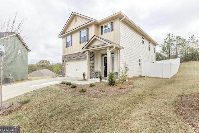 view of front of home featuring board and batten siding, central air condition unit, fence, a garage, and concrete driveway