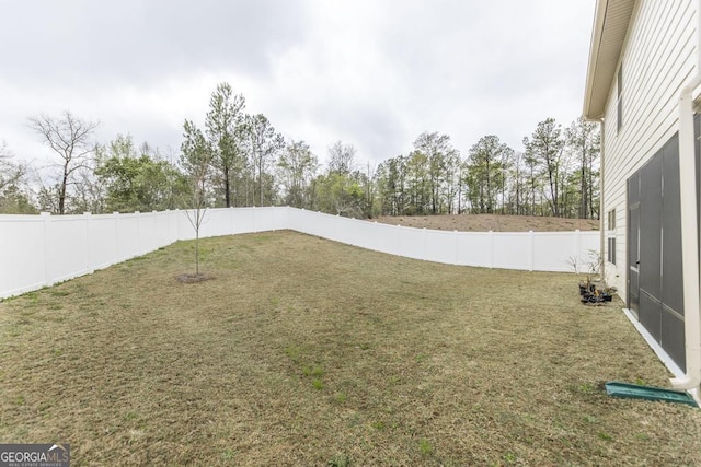 view of yard featuring a fenced backyard