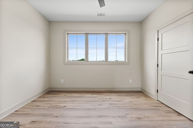 272 Community House Rd, Barnesville, GA 30204 - empty room featuring light wood-style floors, ceiling fan, and baseboards