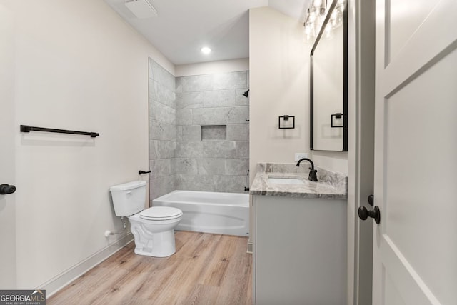 272 Community House Rd, Barnesville, GA 30204 - bathroom with toilet, vanity, wood finished floors, shower / tub combination, and baseboards