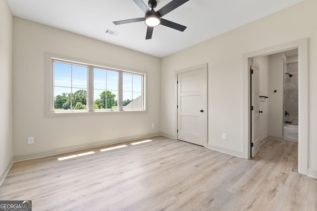 272 Community House Rd, Barnesville, GA 30204 - unfurnished bedroom featuring light wood finished floors, baseboards, and ceiling fan