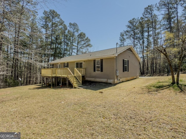 2188 Hi Roc Cir, Conyers, GA 30012 - rear view of house featuring a lawn, a wooden deck, stairway, and crawl space