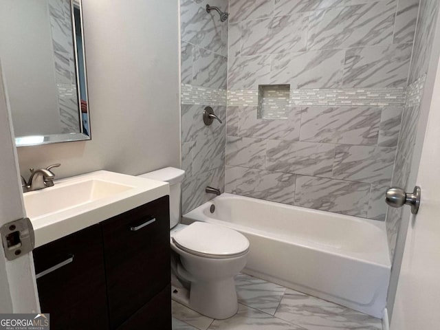 full bathroom featuring marble finish floor, vanity, shower / bath combination, and toilet