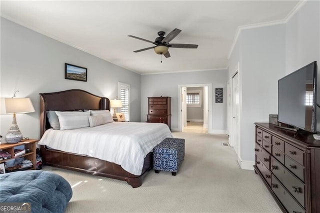 417 Lynne Cir, Alpharetta, GA 30009 - bedroom with baseboards, a closet, light carpet, crown molding, and ceiling fan