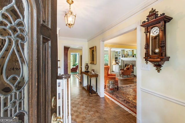 812 Burning Tree Ct SE, Marietta, GA 30067 - entryway featuring crown molding, a fireplace, and baseboards