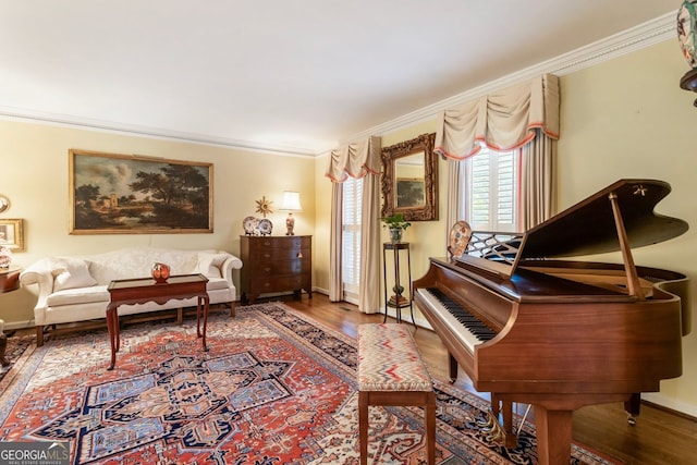 812 Burning Tree Ct SE, Marietta, GA 30067 - sitting room featuring ornamental molding, baseboards, and wood finished floors