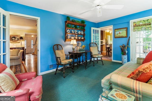 812 Burning Tree Ct SE, Marietta, GA 30067 - sitting room featuring carpet flooring, baseboards, and a ceiling fan