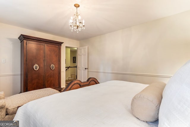 812 Burning Tree Ct SE, Marietta, GA 30067 - bedroom featuring a chandelier