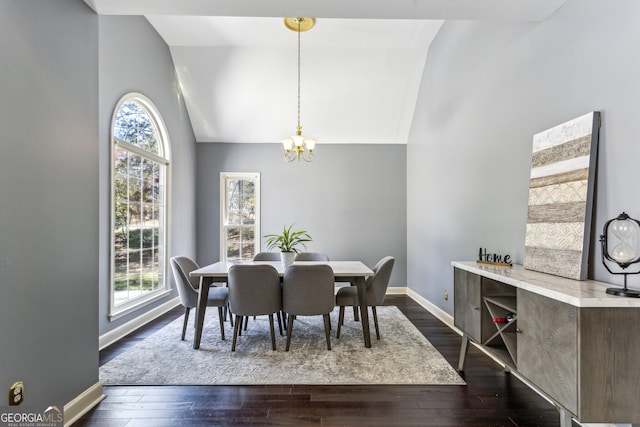 5163 Holly Springs Dr, Douglasville, GA 30135 - dining space with an inviting chandelier, dark wood-style floors, baseboards, and vaulted ceiling