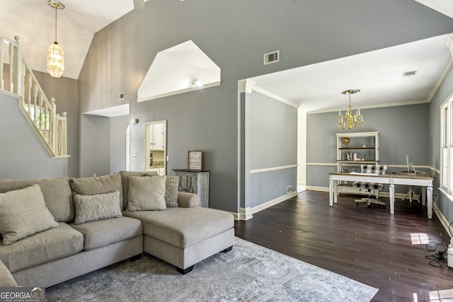 5163 Holly Springs Dr, Douglasville, GA 30135 - living room featuring high vaulted ceiling, hardwood / wood-style flooring, a chandelier, and visible vents