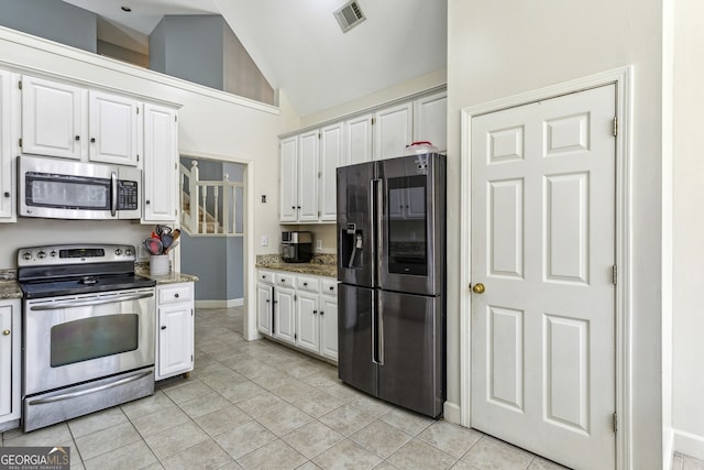5163 Holly Springs Dr, Douglasville, GA 30135 - kitchen featuring white cabinetry, visible vents, and appliances with stainless steel finishes