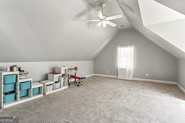 5163 Holly Springs Dr, Douglasville, GA 30135 - recreation room featuring carpet floors, lofted ceiling, baseboards, visible vents, and ceiling fan