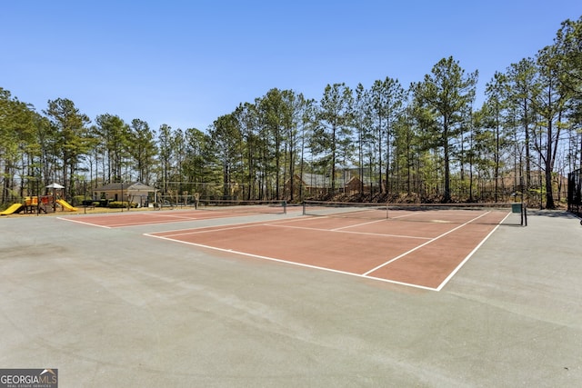 5163 Holly Springs Dr, Douglasville, GA 30135 - view of tennis court featuring community basketball court, playground community, and fence