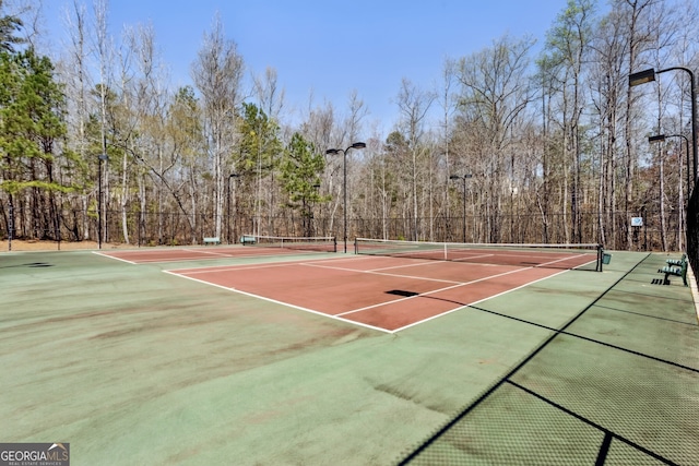 5163 Holly Springs Dr, Douglasville, GA 30135 - view of tennis court with community basketball court and fence