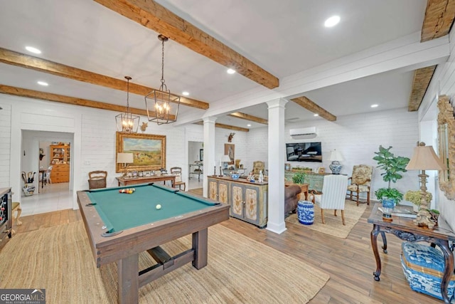 playroom with beamed ceiling, ornate columns, wood finished floors, brick wall, and pool table