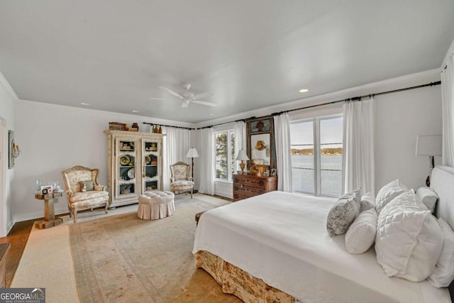 bedroom with baseboards, crown molding, recessed lighting, and a ceiling fan