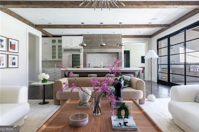 5495 Mount Vernon Pkwy, Atlanta, GA 30327 - living room with baseboards, beamed ceiling, and dark wood-type flooring