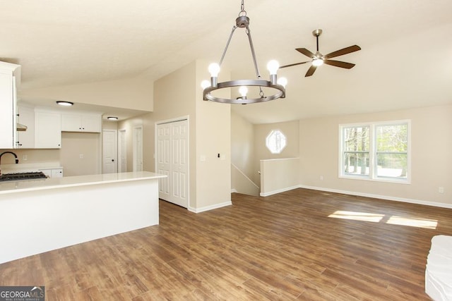 759 Oak Grove Rd, Carrollton, GA 30117 - kitchen featuring a peninsula, white cabinets, visible vents, light countertops, and a chandelier