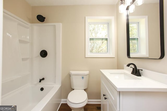 759 Oak Grove Rd, Carrollton, GA 30117 - bathroom featuring toilet, tub / shower combination, baseboards, and vanity