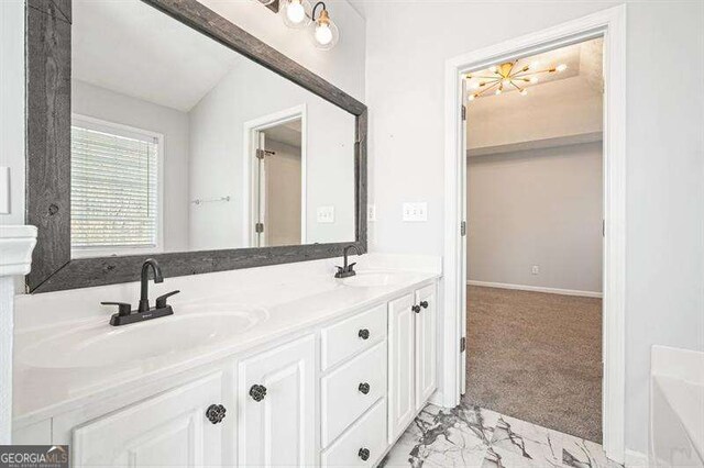 802 Eagle Glen Xing, Woodstock, GA 30189 - bathroom with double vanity, marble finish flooring, and a bath