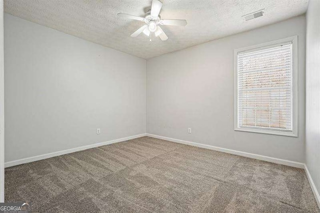802 Eagle Glen Xing, Woodstock, GA 30189 - unfurnished room featuring a textured ceiling, carpet flooring, and ceiling fan