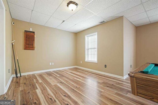 802 Eagle Glen Xing, Woodstock, GA 30189 - spare room featuring a paneled ceiling and light wood-style flooring