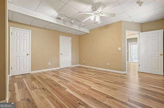 802 Eagle Glen Xing, Woodstock, GA 30189 - spare room with light wood-type flooring, ceiling fan, and rail lighting