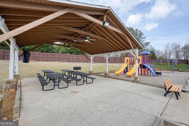 802 Eagle Glen Xing, Woodstock, GA 30189 - fenced backyard featuring a ceiling fan, a playground, a patio area, and a gazebo