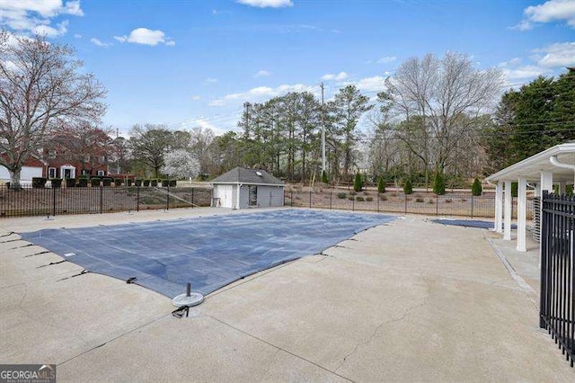 802 Eagle Glen Xing, Woodstock, GA 30189 - community pool featuring a patio area and an outbuilding