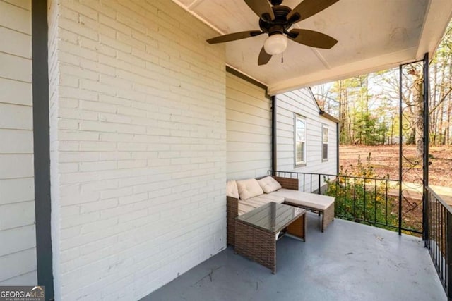 view of patio featuring a ceiling fan