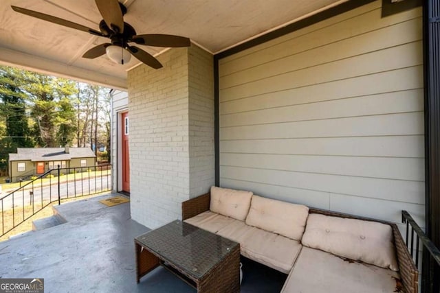 view of patio featuring a ceiling fan