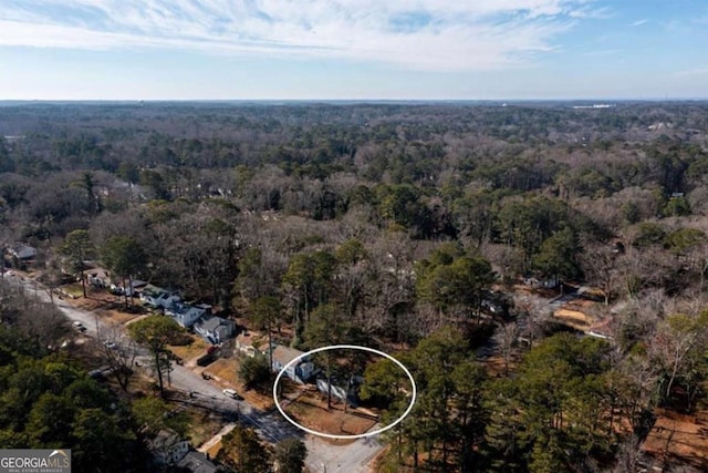 aerial view featuring a forest view