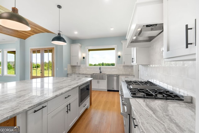 264 Community House Rd, Barnesville, GA 30204 - kitchen with appliances with stainless steel finishes, a sink, white cabinets, backsplash, and recessed lighting