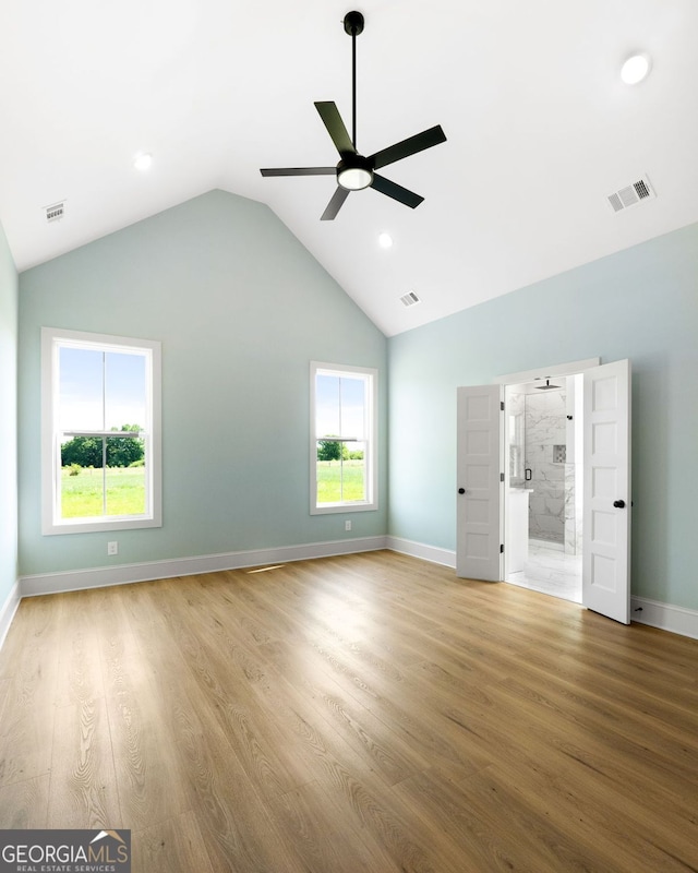 264 Community House Rd, Barnesville, GA 30204 - unfurnished living room featuring ceiling fan, vaulted ceiling, light wood-type flooring, baseboards, and recessed lighting