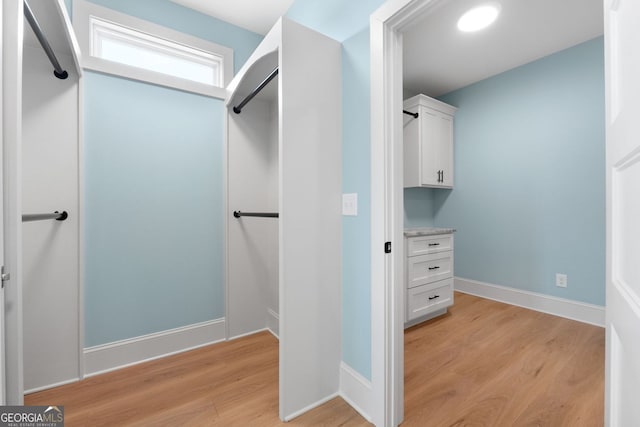 264 Community House Rd, Barnesville, GA 30204 - walk in closet with light wood-style flooring