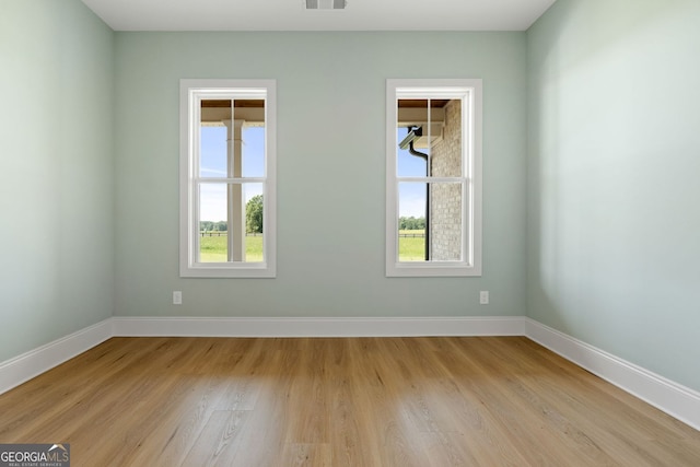 264 Community House Rd, Barnesville, GA 30204 - empty room with light wood-style floors and baseboards