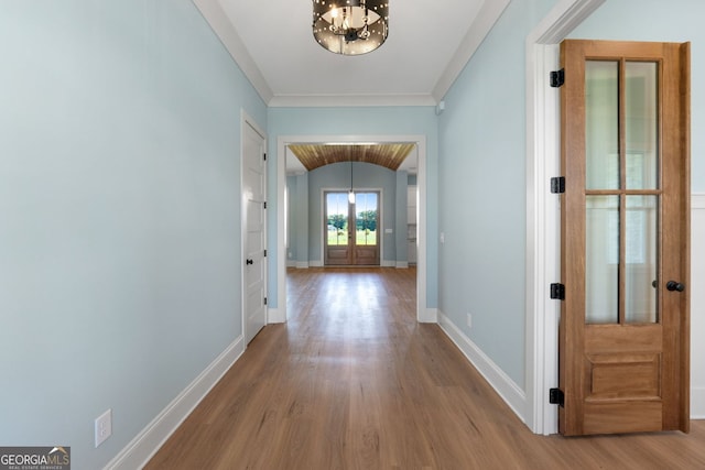 264 Community House Rd, Barnesville, GA 30204 - hallway featuring french doors, a chandelier, wood finished floors, and baseboards