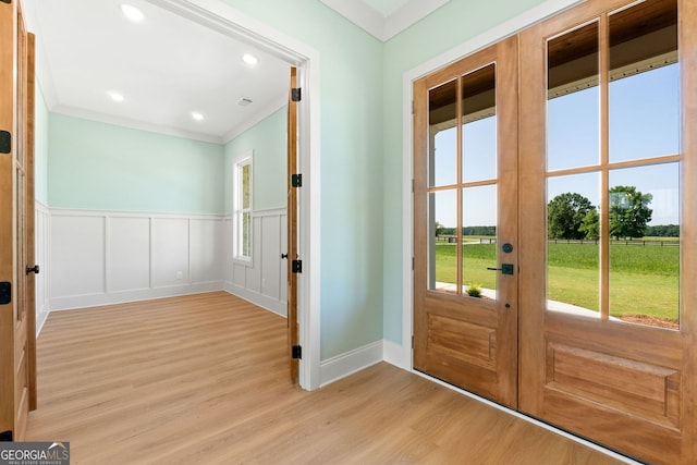 264 Community House Rd, Barnesville, GA 30204 - doorway with french doors, light wood-style flooring, ornamental molding, a wainscoted wall, and recessed lighting