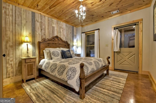bedroom with visible vents, a chandelier, wood ceiling, and wood walls