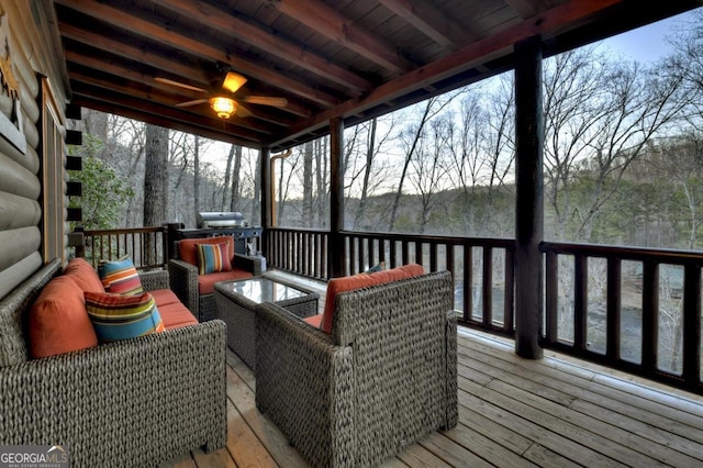 deck featuring outdoor lounge area