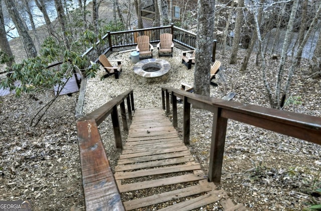 exterior space with a fire pit
