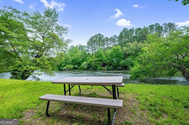 view of property's community with a water view