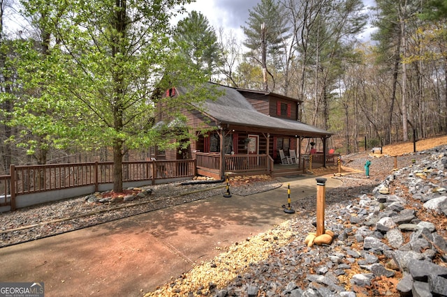 1301 Newport Dr, Ellijay, GA 30540 - view of front of property with a porch and roof with shingles