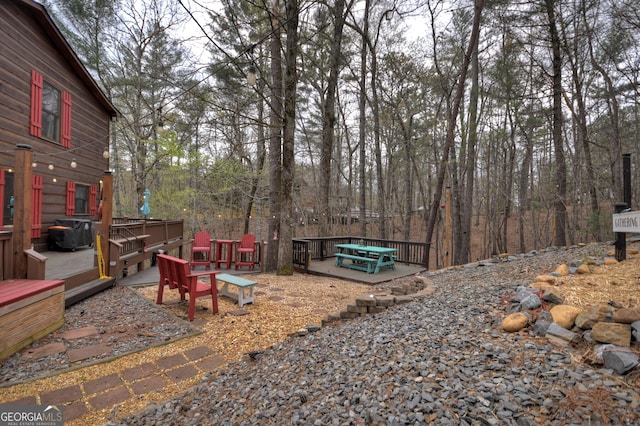 1301 Newport Dr, Ellijay, GA 30540 - view of yard featuring a wooden deck and a forest view