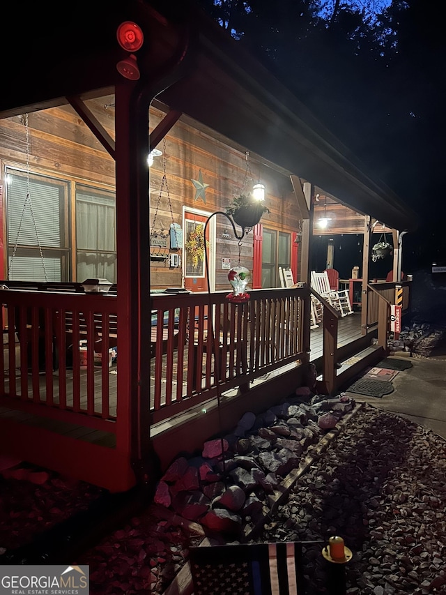1301 Newport Dr, Ellijay, GA 30540 - deck at night with covered porch