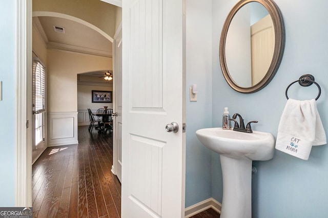 307 Montgomery Way, Woodstock, GA 30188 - bathroom featuring crown molding, wood-type flooring, a wainscoted wall, and a ceiling fan